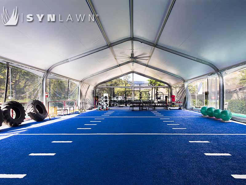 Blue SYNLawn SpeedTurf with field markings for outdoor crossfit training facility