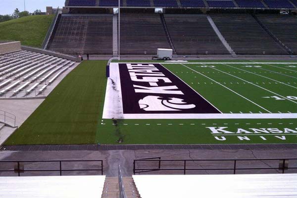 Artificial field turf for Kansas State University football field with KSU logos