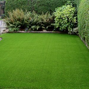 Newly laid artificial lawn in a front garden. 