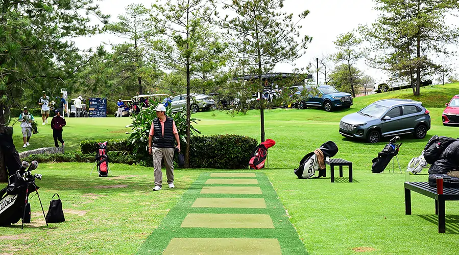 Golfer on artificial grass driving range from SYNLawn
