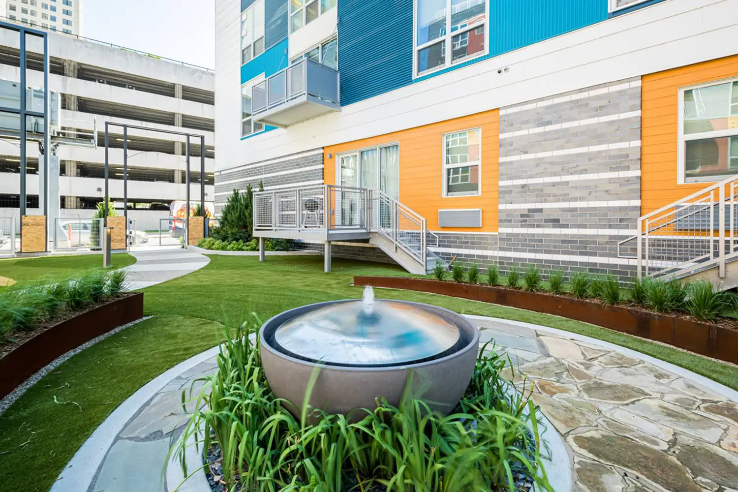 Artificial grass apartment common area installed by SYNLawn